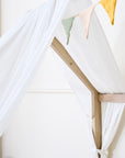 Close-up of the Casa Grande Curtains fabric roof accessory cover in white.
