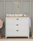 Verona chest changer in white and oak with three deep drawers, combining style and functionality for nursery storage and baby changing.