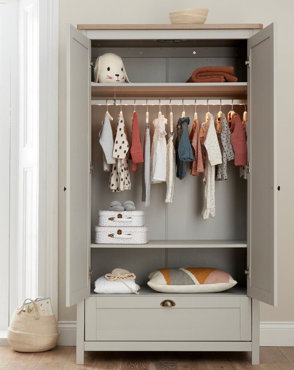 verona wardrobe with open doors show neatly organised clothes, top and bottom shelf and storage drawer