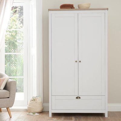 Verona wardrobe in white and oak with spacious interior storage, perfect for organising baby clothes and essentials.