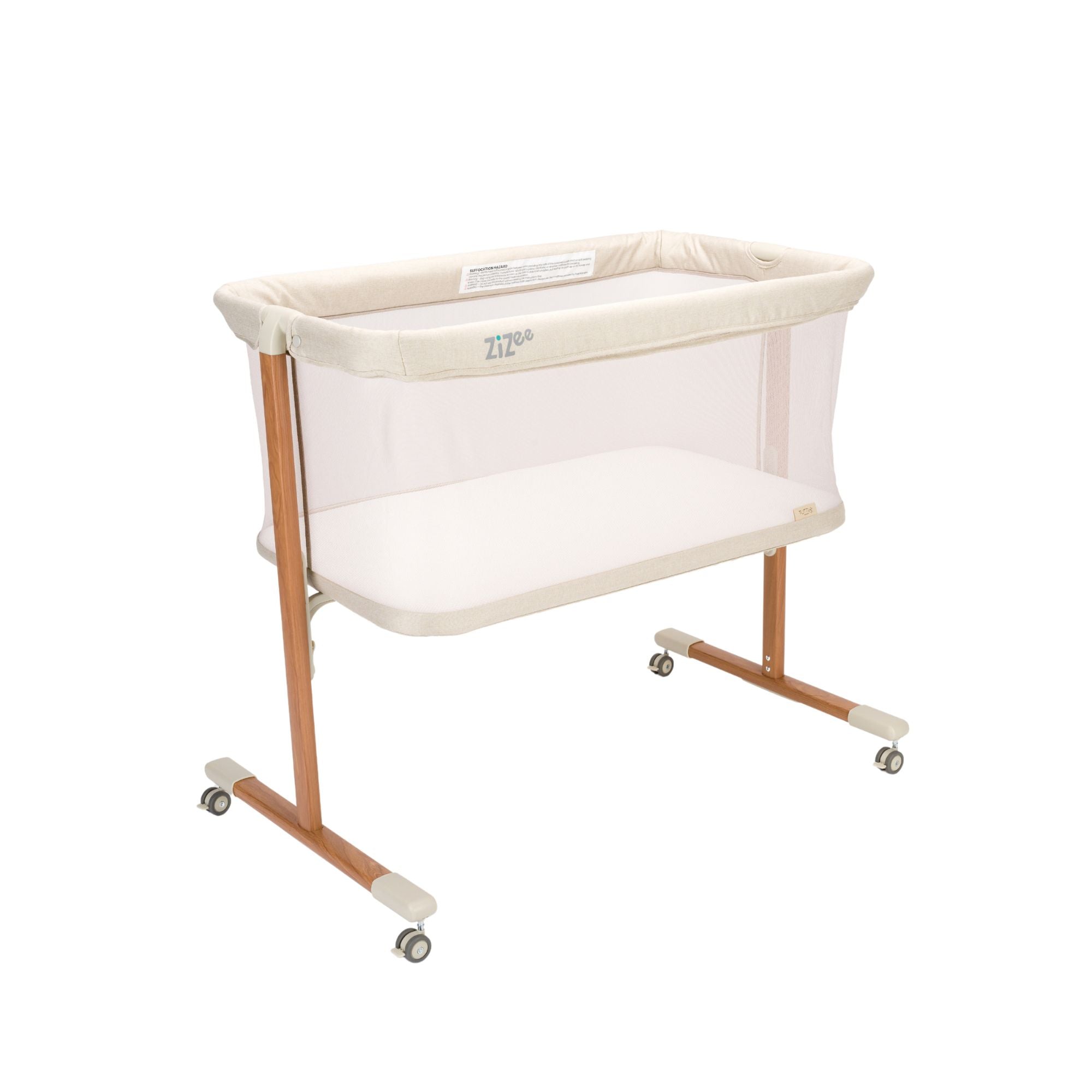 Beige baby crib with wheels on a white background